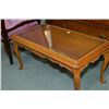 Image 1 : Mid 20th century coffee table with carved skirt and upper supports