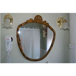 Antique mirror in moulded floral frame