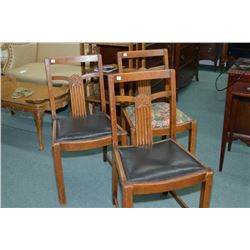Three wooden dining chairs