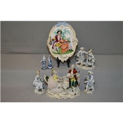 Selection of vintage German porcelain figures including lady and gentleman in a music room, small pa