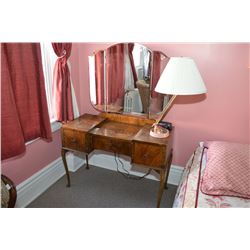 Matched grain walnut three drawer triple mirror vanity on tall cabriole feet with original bakelite 