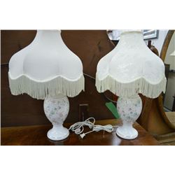A pair of matching porcelain table lamps