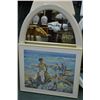 Image 1 : Oval framed mirror and a framed print family at the seaside