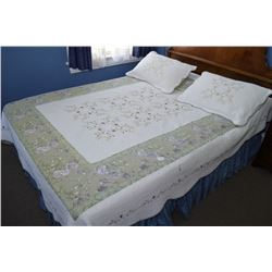 Selection of linens including bedspread, shams, skirt, etc