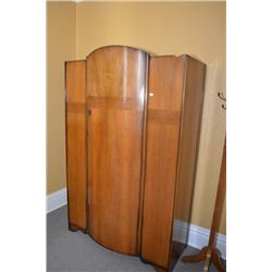 Large single curve door matched grain wardrobe