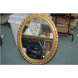 Large gilt framed oval mirror 32" X 27"