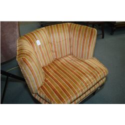 Retro chair with gold striped upholstery and button back detail