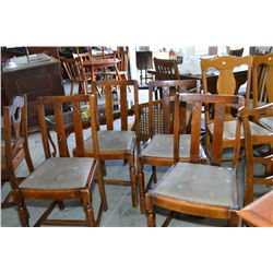Four wooden dining chairs with slat back, upholstered seats and small carved detail