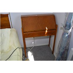 Small single drawer quarter cut oak drop leaf desk with partially fitted interior