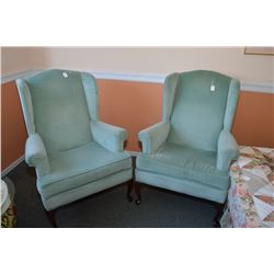 Pair of wingback chairs with cabriole feet