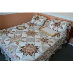 Selection of linens including bedspread, sham, pillowcase, etc.