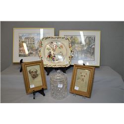 Four framed prints including two street scenes and two dogs plus a collector plate and a crystal bis