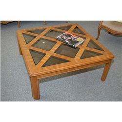 Semi Contemporary mahogany coffee table with multiple glass top panels and a co-ordinating end table