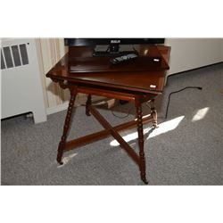 Antique Canadiana side table with turned supports and crossed stretcher