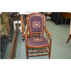 Antique wooden parlour chair with spindle supports and needle upholstered seat and back