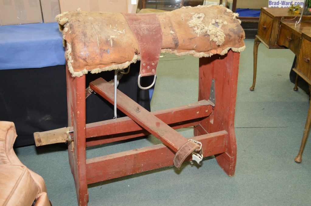 Antique wooden saddle stand