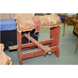 Antique wooden saddle stand