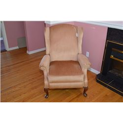 Upholstered wingback recliner with cabriole feet
