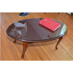 Semi contemporary coffee table with cabriole feet