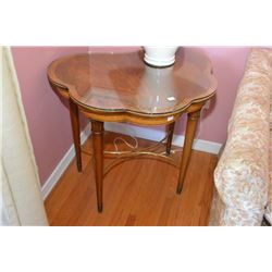 Hand crafted sculpted top occasional table Note: label underneath "This piece was handmade in the wo