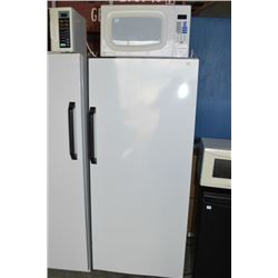 Small General Electric fridge and a Diplomat microwave oven