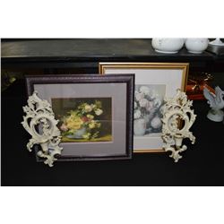 Two framed still life prints and two moulded candle sconces