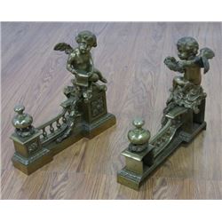 Pair of Bronze Chenets with Putti