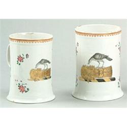 Two Chinese famille-rose tankards, the tall finely potted sides with strap handles and rui termin...