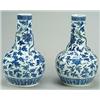 Image 1 : A pair of Chinese bottle vases, the slender necks applied with slender dragons and decorated over...