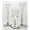 Image 1 : Three opaque-twist wine glasses, comprising: a toasting glass, the drawn trumpet bowl supported o...