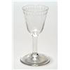 Image 1 : A hollow-stemmed wine glass, the round funnel bowl engraved and polished with an 'oxo' band, abov...