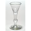 Image 1 : A composite-stemmed wine glass, of drawn trumpet form, the plain stem with tear inclusion above a...