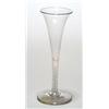 Image 1 : An opaque-twist wine flute, of drawn trumpet form on a double series stem and conical foot, 19cm...