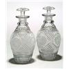 Image 1 : A pair of cut ovoid spirit decanters and mushroom stoppers, with a geometric pattern field of fin...