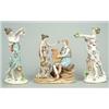 Image 1 : A pair of German porcelain models of classical maidens, one holding a wreath, the other a ewer, e...