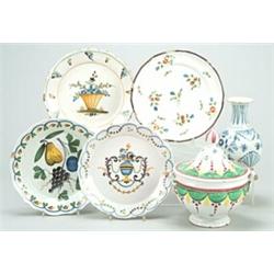 A quantity of mostly French faience, comprising mostly bowls and plates and including Quimper, Ro...