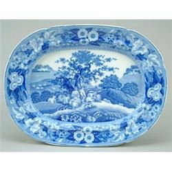 A Piping Shepherd pattern meat dish, printed in blue with the genre scene of a shepherd playing t...