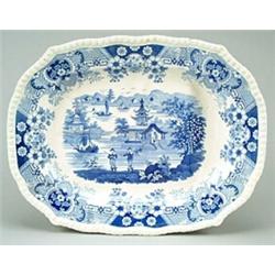 A Ralph Stevenson "Royal Stone China" well-and-tree meat dish, with gadrooned rim, printed in blu...