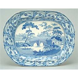 A Lanercost Priory pattern meat dish, printed in blue with the priory in the background and a for...