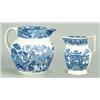 Image 1 : Two blue-printed jugs with chinoiserie patterns: a large jug of Dutch shape with strap handle and...
