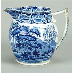 A Sundial pattern jug, with angular handle and turned rim around the shoulder, printed in blue wi...