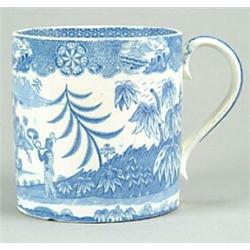 A Horn Blower pattern mug, of cylindrical shape with strap handle, printed in blue with a horn bl...