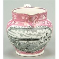A small Sunderland lustre jug printed with "A West View of the Cast-iron Bridge over the River We...