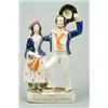 Image 1 : A group of the 'Sailor's Return', modelled with the mariner waving his hat, arm in arm with his s...
