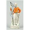 Image 1 : A figure of Guiseppe Garibaldi, modelled standing holding a flag titled LIBERTE, partially colour...