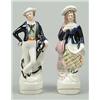 Image 1 : A pair of figures of a sailor and companion, the sailor modelled leaning on a anchor, his compani...