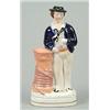 Image 1 : A model of a sailor leaning on a capstan, partially coloured and gilt, 20cm high, mid 19th centur...