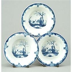 Three Worcester blue and white chinoiserie patty pans, the wells painted with a man with a speare...