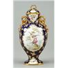 Image 1 : A Copelands china two-handled dark-blue-ground ovoid vase and cover, painted in the Sevres style...