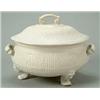 Image 1 : A salt-glazed stoneware two-handled oval tureen and cover, moulded with diaper panels with foliat...